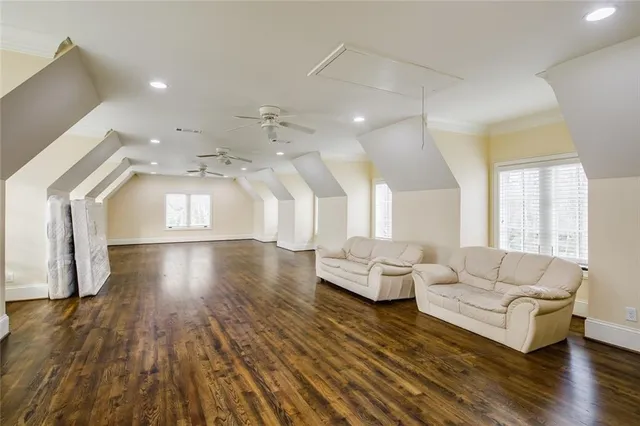 a bathroom with a glass shower door and a sink