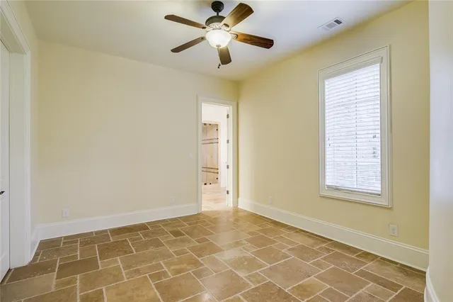 a view of living room with granite countertop furniture and kitchen view