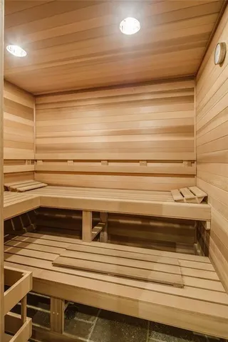 a bathroom with a bathtub and shower