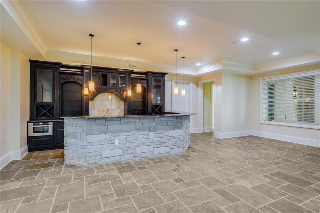 35 Mt Paran Road Northwest Sandy Springs, GA 30327 - Photo 46 of 61 a view of living room with granite countertop furniture and kitchen view
