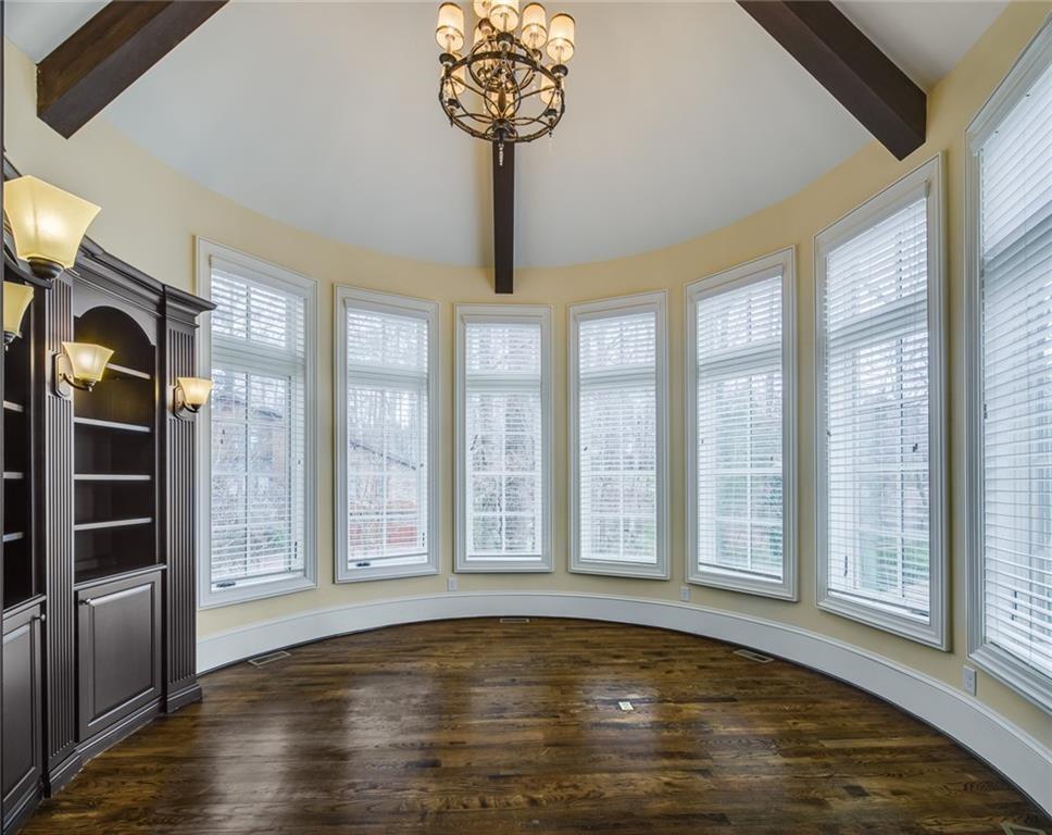 35 Mt Paran Road Northwest Sandy Springs, GA 30327 - Photo 7 of 61 a view of an empty room with a window and wooden floor