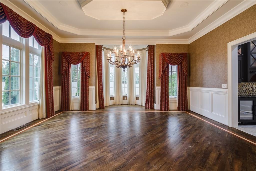 35 Mt Paran Road Northwest Sandy Springs, GA 30327 - Photo 10 of 61 a view of a big room with wooden floor and windows