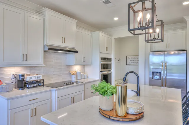 a spacious bathroom with a granite countertop sink mirror and double