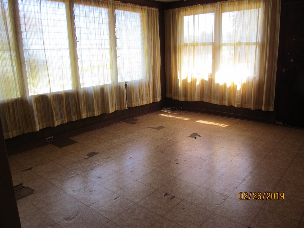 5681 Kaapuni Road Kapaa, HI 96746 - Photo 3 of 8 a view of an empty room with a window