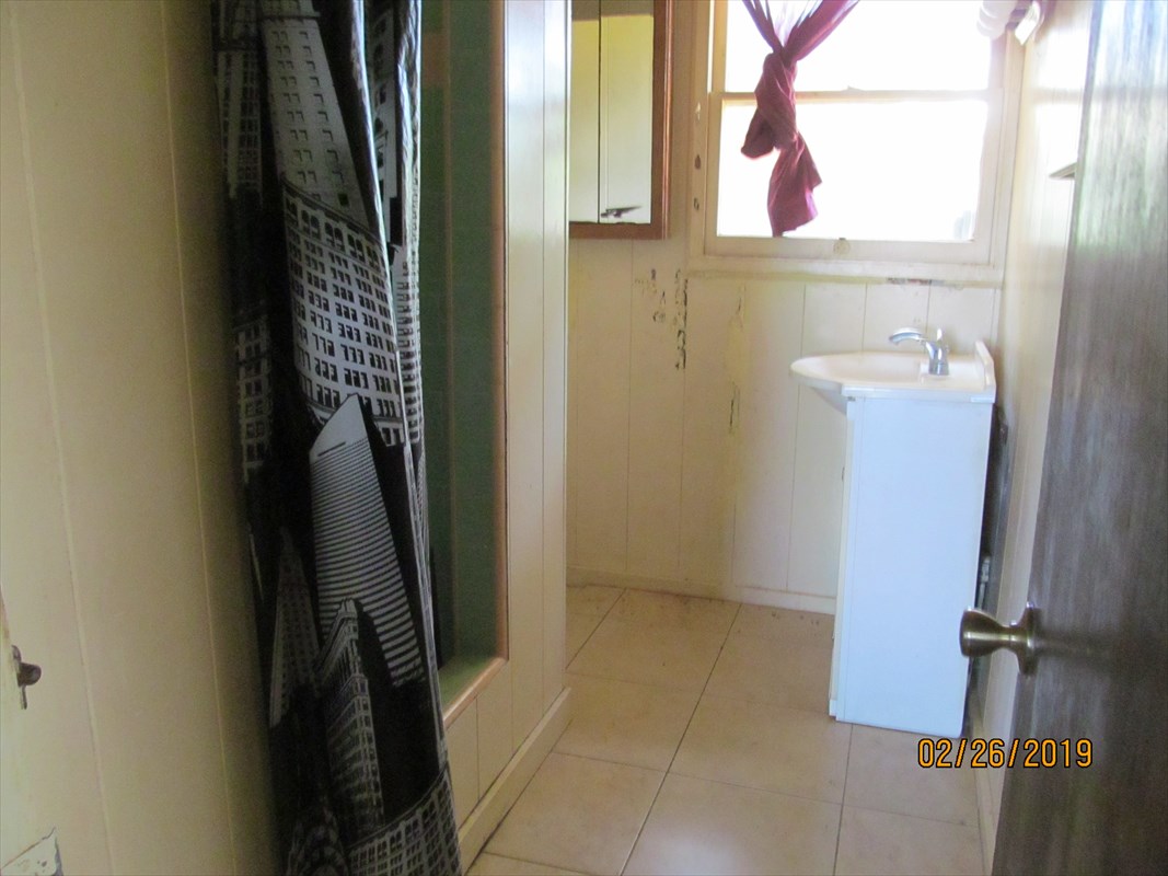 5681 Kaapuni Road Kapaa, HI 96746 - Photo 7 of 8 walk in closet with window