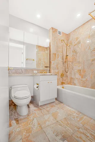 a living room with furniture rug and a large window