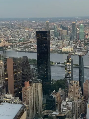 a view of a patio with couches table and chairs