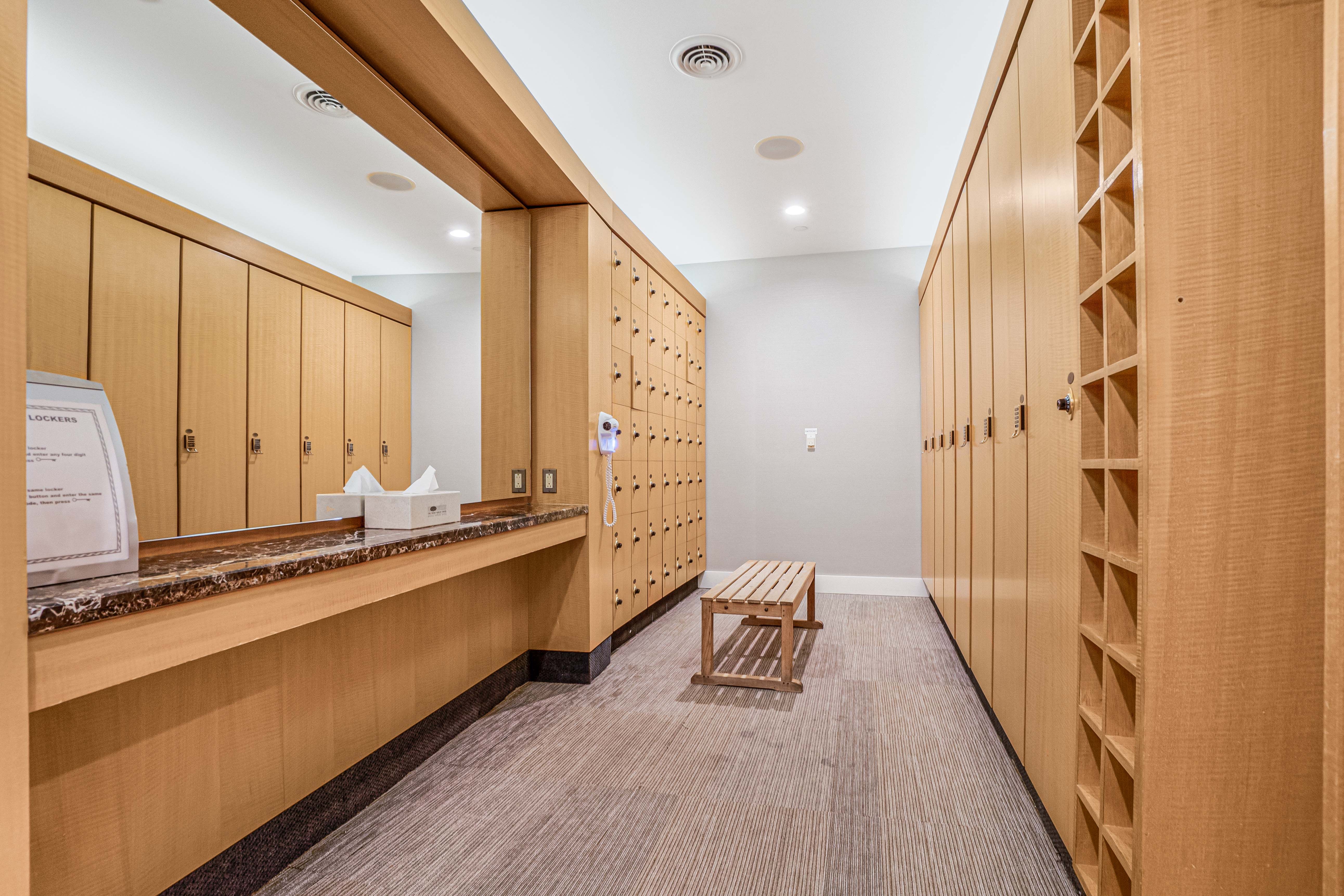 845 United Nations Plaza, Unit 5D Manhattan, NY 10017 - Photo 23 of 28 a bathroom with a sink a mirror and a bathtub
