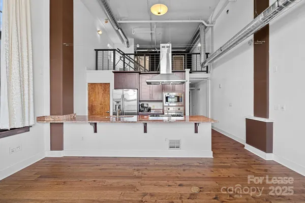 a view of kitchen with stainless steel appliances