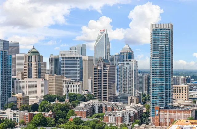 a view of a city with tall buildings