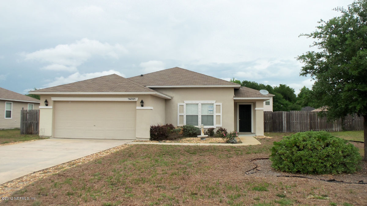 76251 Long Pond Loop Yulee, FL 32097 - Photo 1 of 12 Front