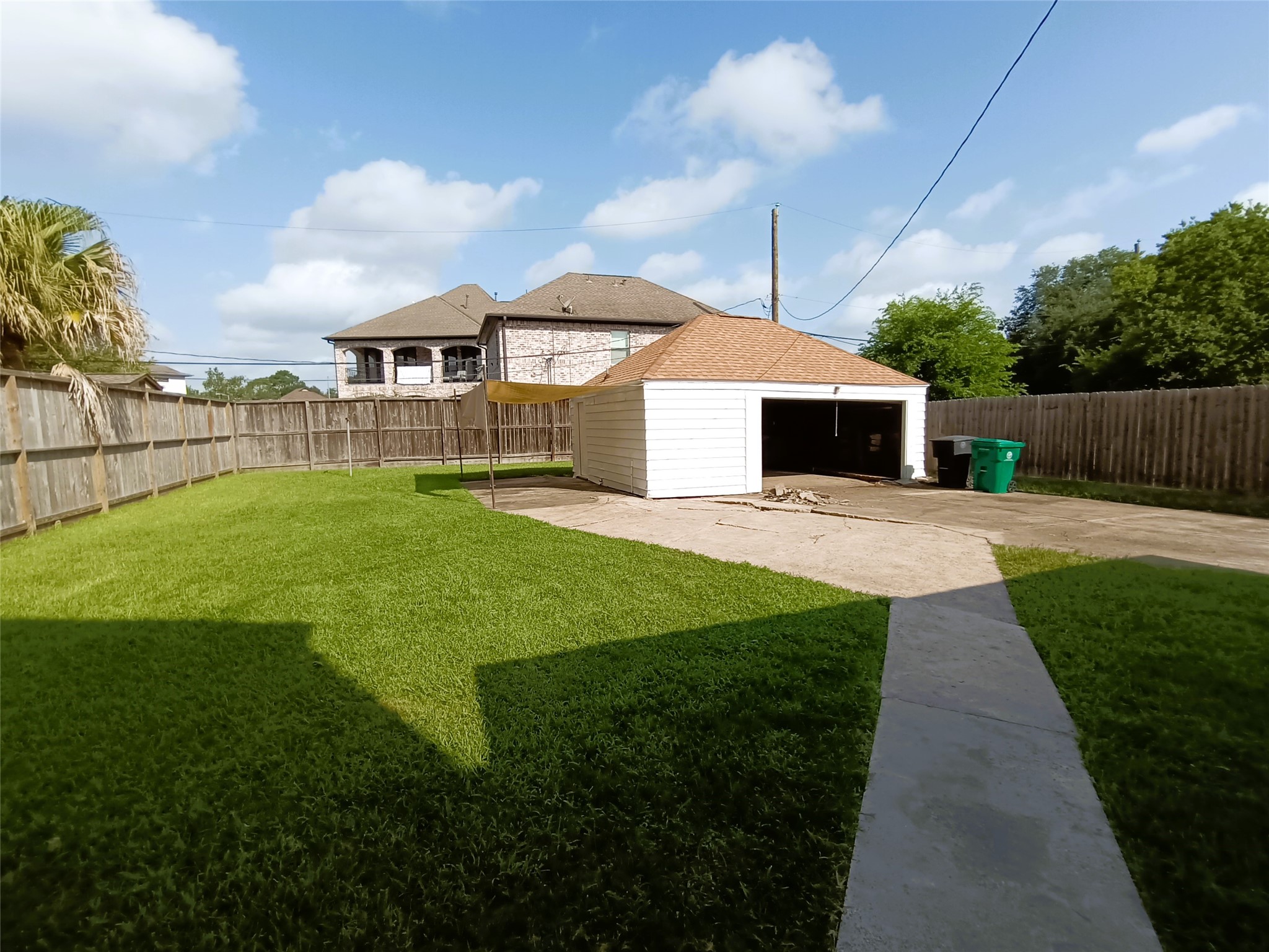 6906 Van Etten Street Houston, TX 77021 - Photo 29 of 30 Backyard fully fenced. Tarp to relax. With a one car garage.