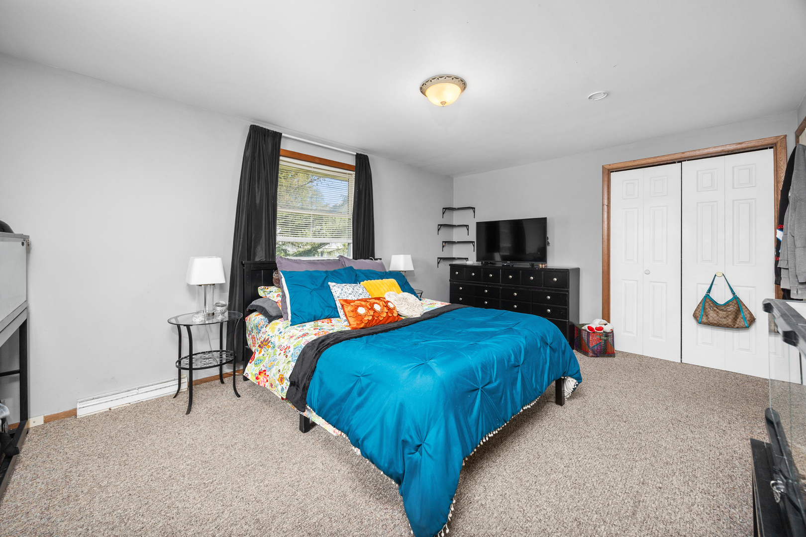 215 Tollview Court Gilberts, IL 60136 - Photo 12 of 29 a bedroom with a bed and wooden floor