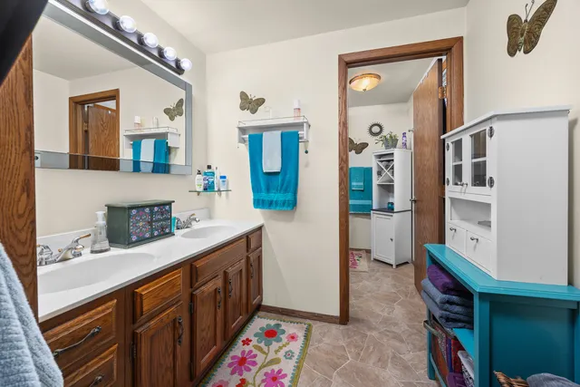 a kitchen with sink cabinets and stove