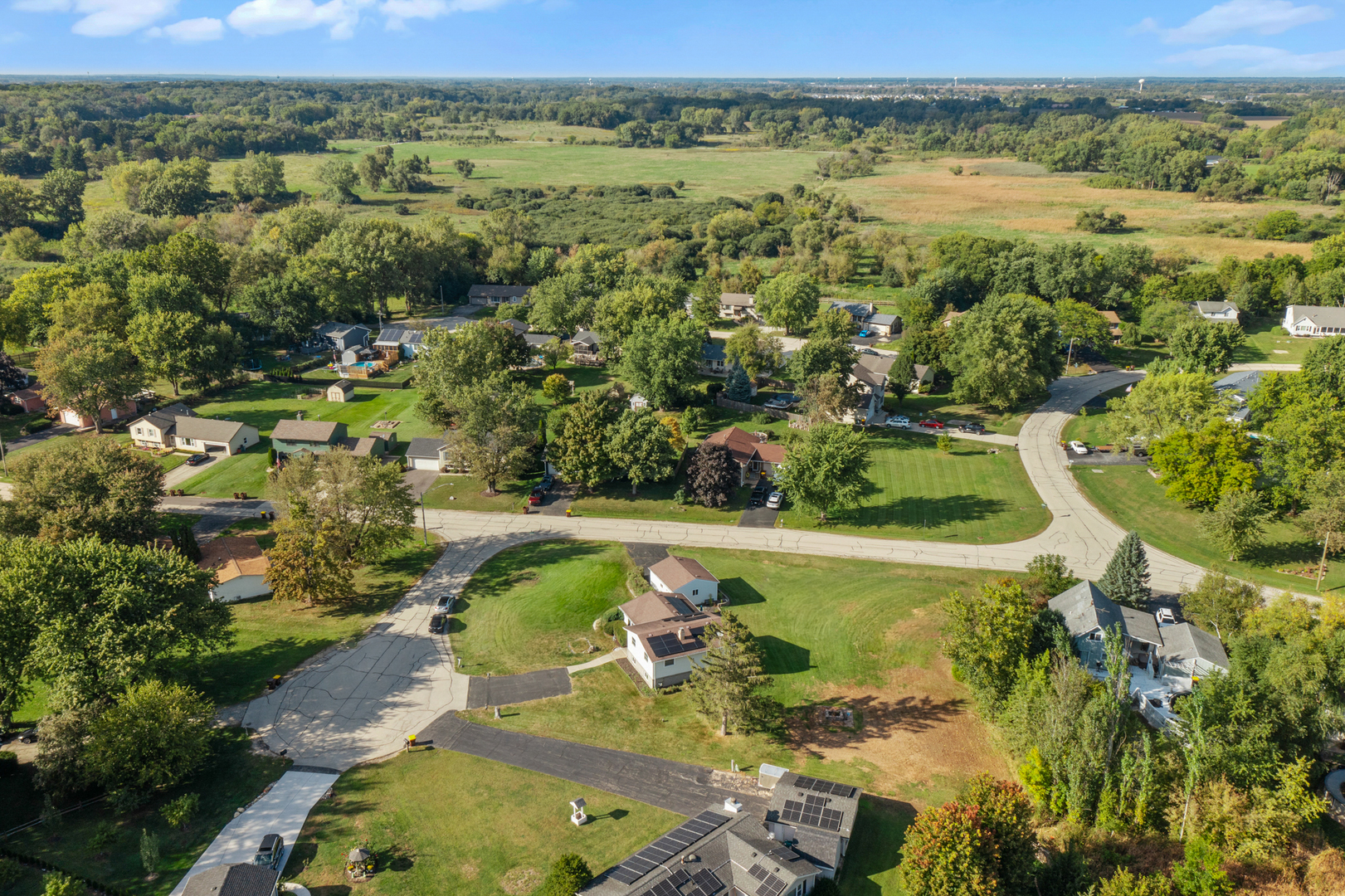 215 Tollview Court Gilberts, IL 60136 - Photo 25 of 29 a view of a lake with a mountain