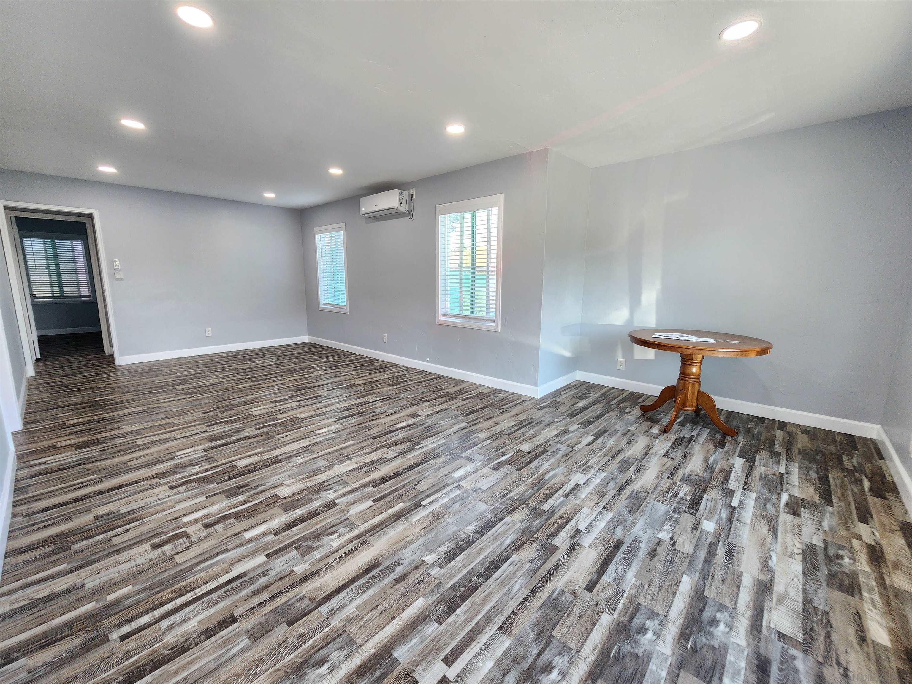 0 4024-4026 College Avenue San Diego, CA 92115 - Photo 3 of 20 a bedroom with a bed and a window