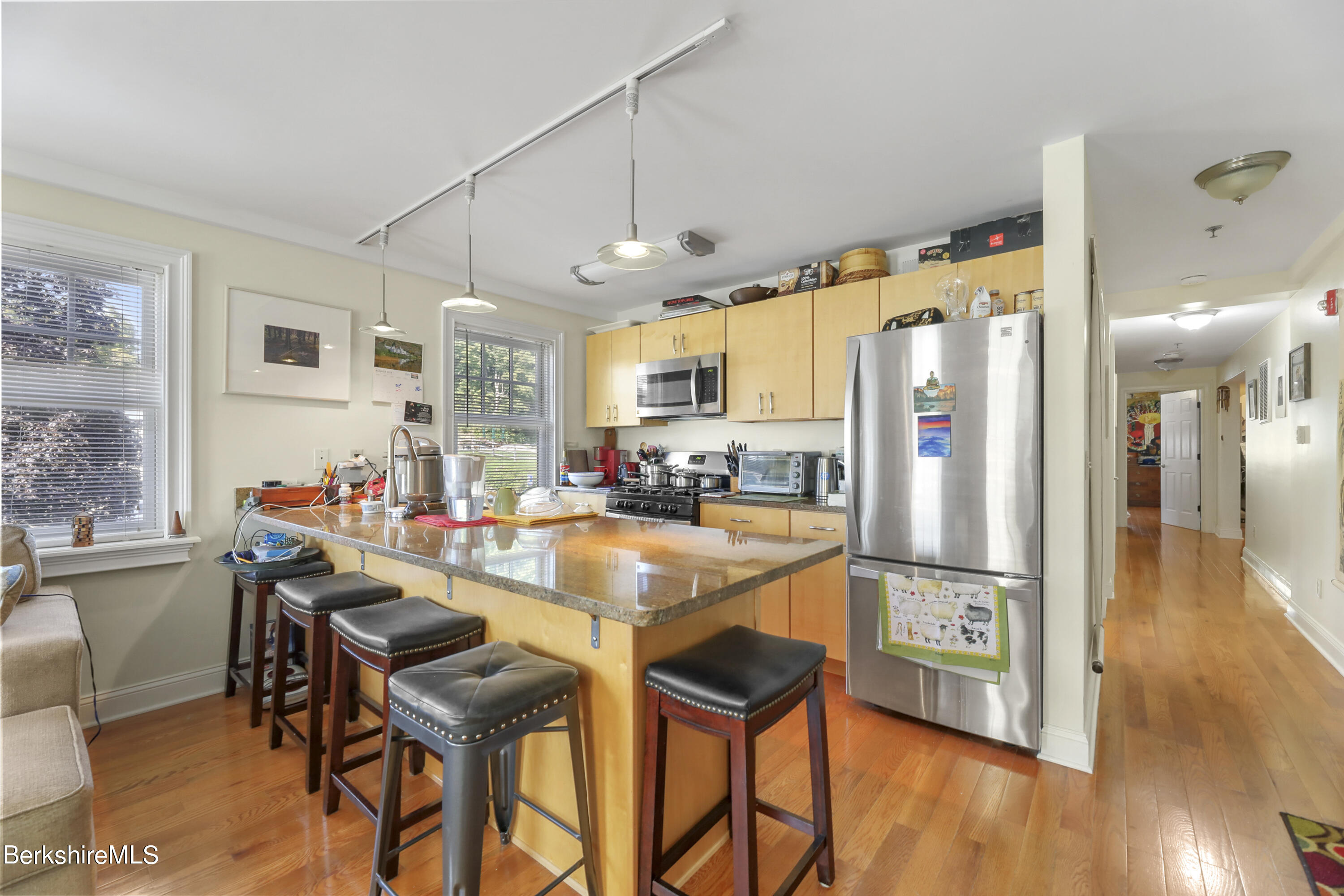 29 Main Street West Stockbridge, MA 01266 - Photo 25 of 51 a room with stainless steel appliances kitchen island granite countertop furniture and a view of kitchen