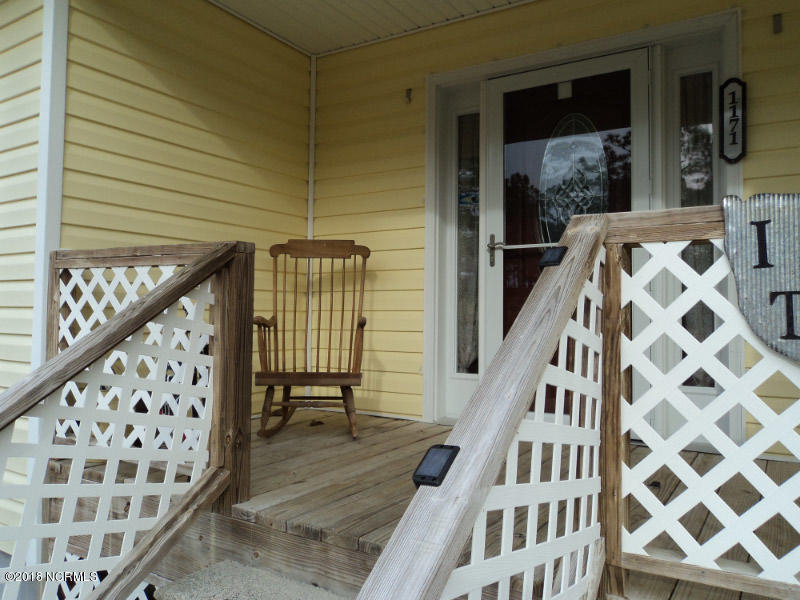 1171 Springdale Road Southport, NC 28461 - Photo 8 of 40 Cozy Front Porch