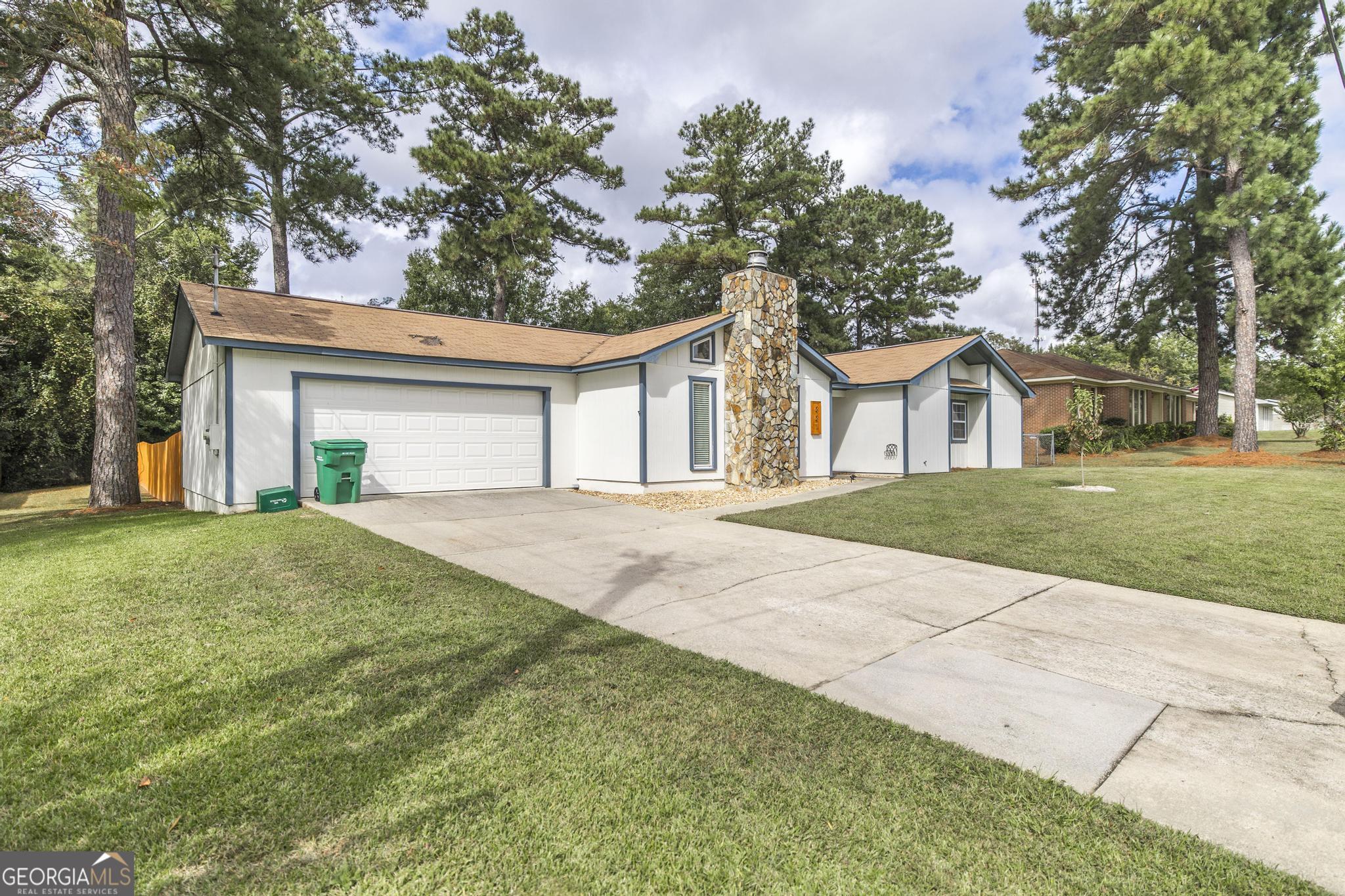 221 Gilchrist Drive Warner Robins, GA 31093 - Photo 2 of 33 a view of house with a yard