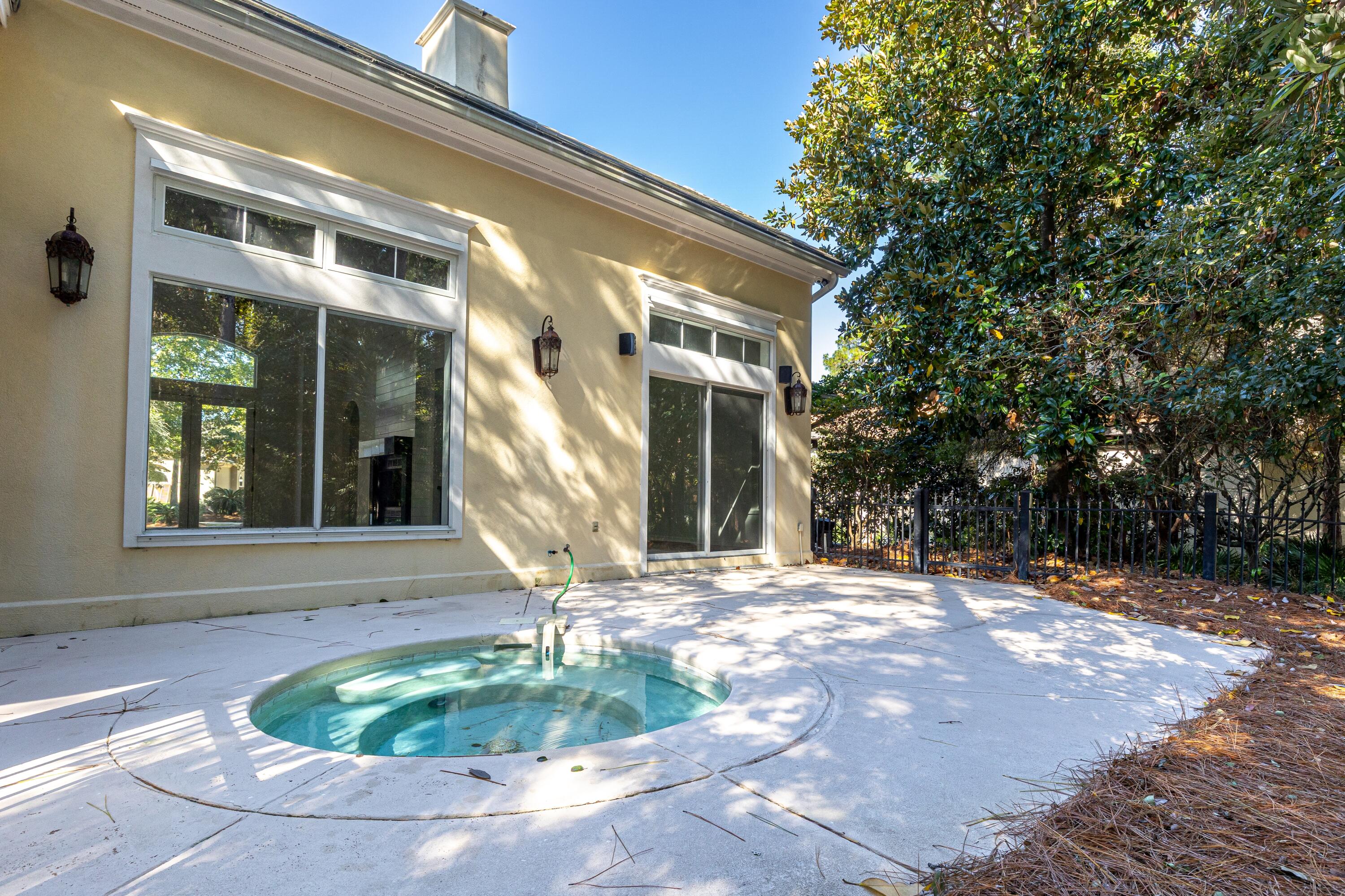 2928 Pine Valley Road Miramar Beach, FL 32550 - Photo 19 of 76 a front view of a house with garden