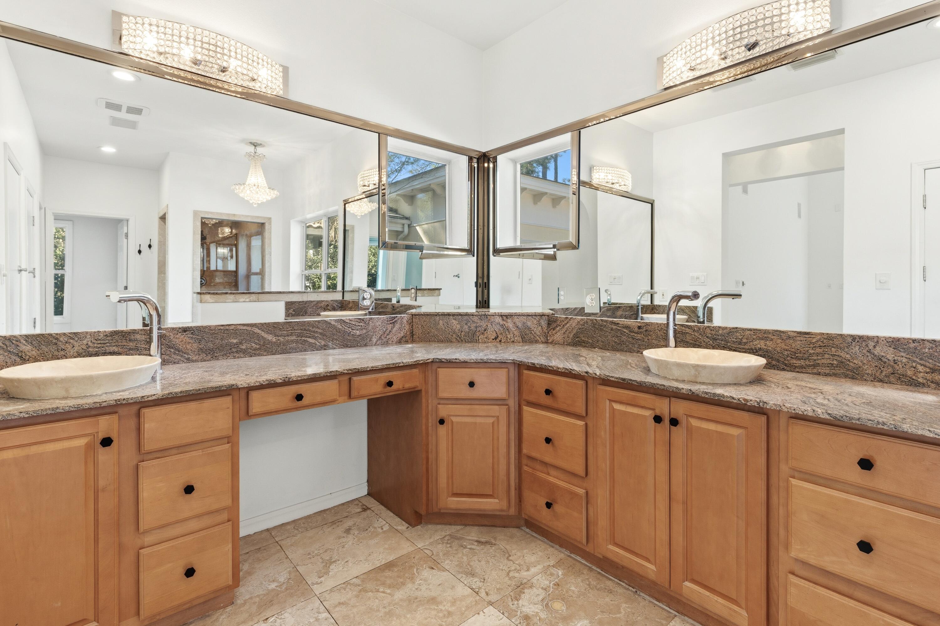 2928 Pine Valley Road Miramar Beach, FL 32550 - Photo 23 of 76 a bathroom with double sink and a large mirror