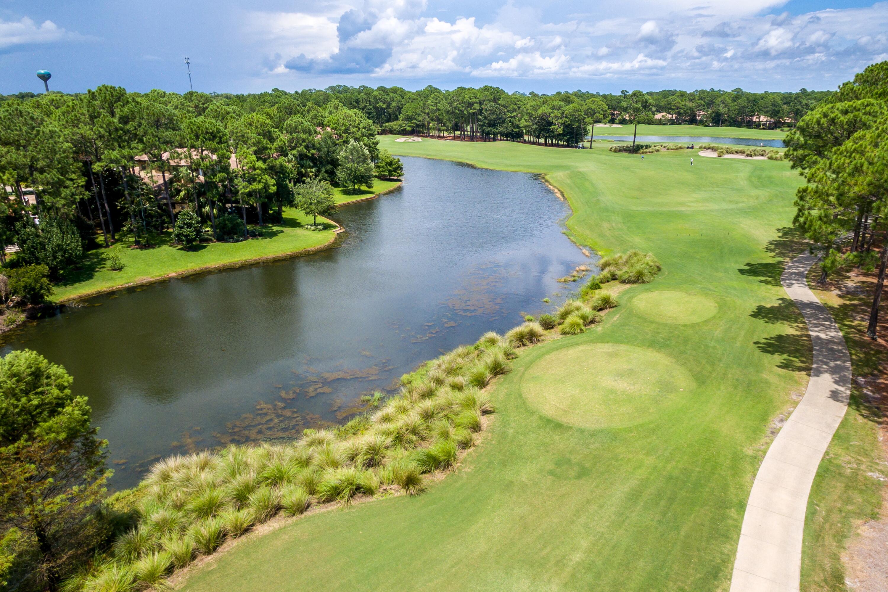 2928 Pine Valley Road Miramar Beach, FL 32550 - Photo 58 of 76 an aerial view of a house with a yard and lake view