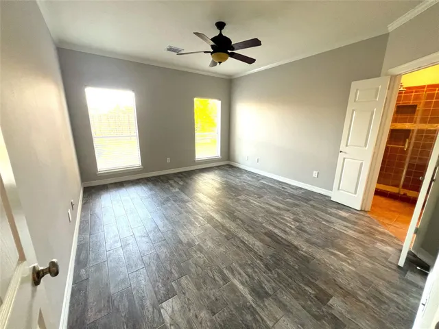 a view of a bedroom with a natural light