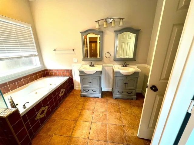 a bathroom with a toilet and a sink