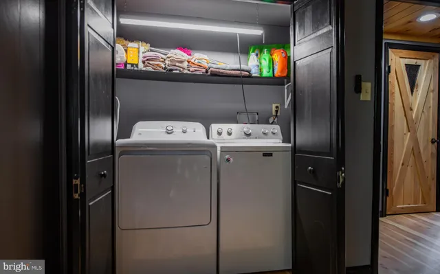 a utility room with dryer and washer
