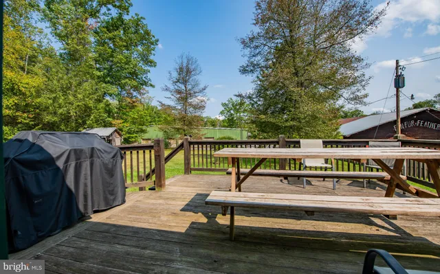 a view of a bench on the roof deck