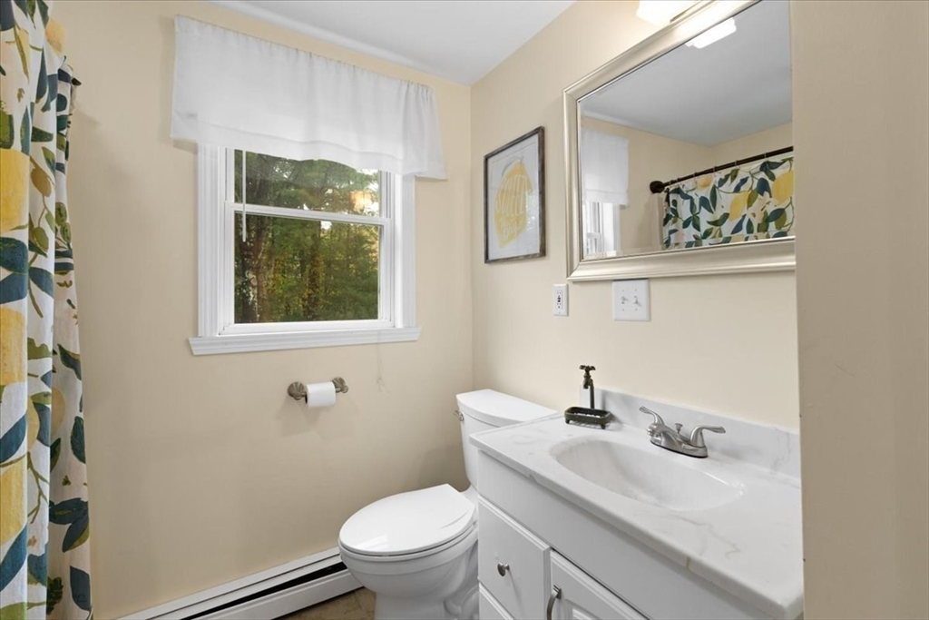 185 Temi Road Raynham, MA 02767 - Photo 11 of 33 a bathroom with a sink and a toilet