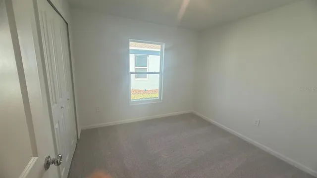 a bathroom with a sink toilet tub and shower