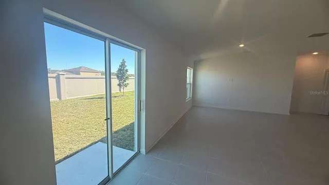 a bathroom with a shower and vanity