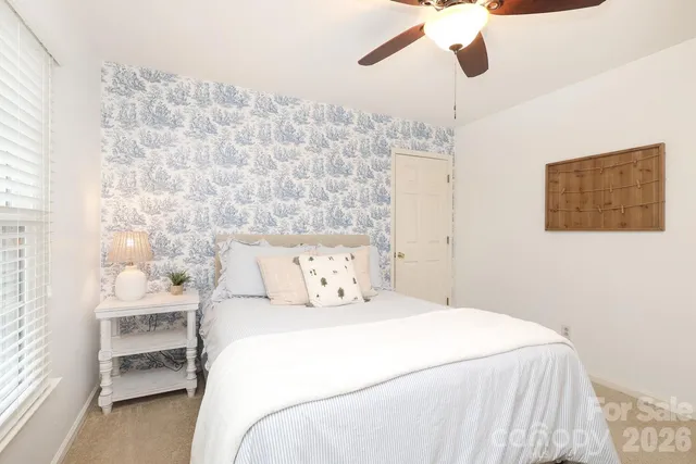 a view of a yard with a tree