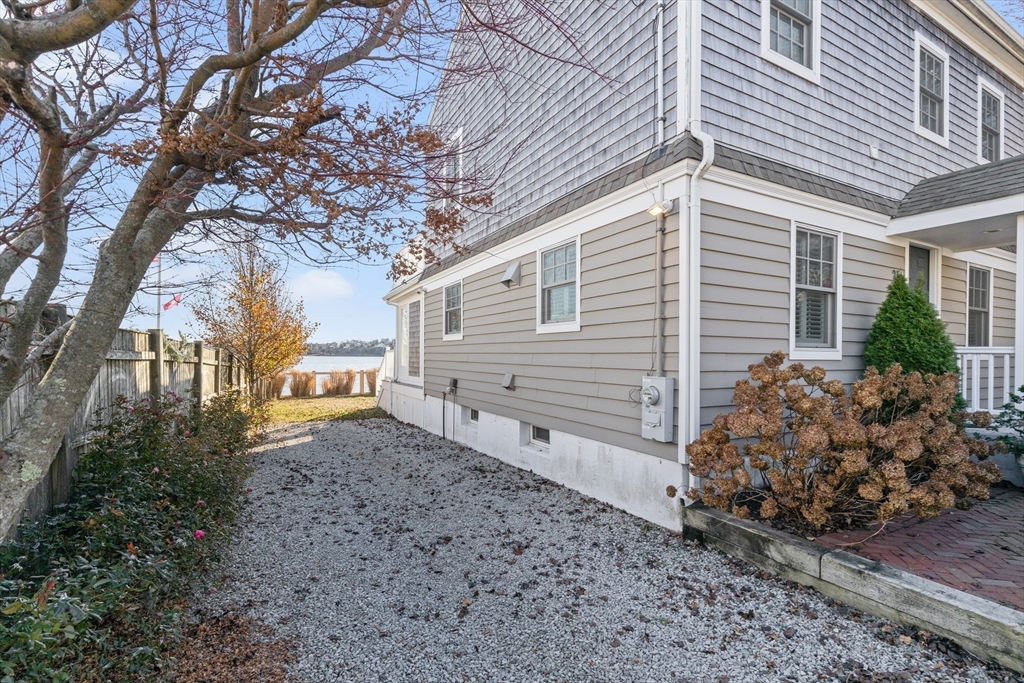 25 Bay Street Hull, MA 02045 - Photo 26 of 27 a view of a house with a yard and tree