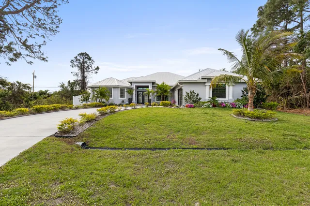 a view of a house with a big yard