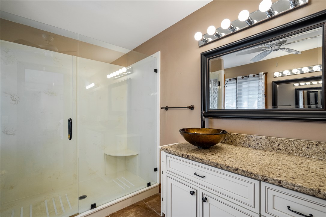 324 Hobson Road Anderson, SC 29621 - Photo 25 of 46 This bathroom features a contemporary shower and a vanity with a unique vessel sink.