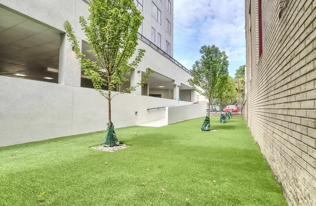 a house with garden in front of it