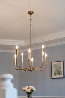 a bedroom with a bed and a night stand