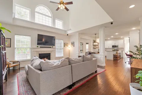 a view of a dining room with furniture window and wooden floor