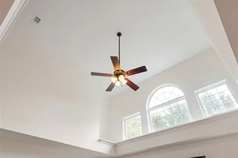a kitchen with granite countertop a stove and a sink