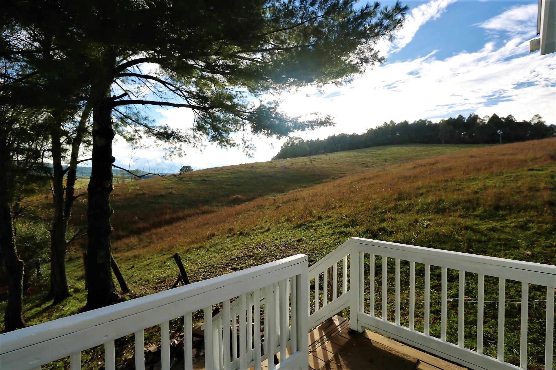174 Spring Dale Road Southwest Floyd, VA 24091 - Photo 18 of 37 a balcony with an ocean view