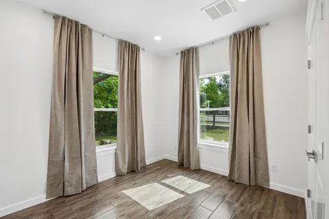 a view of entryway with wooden floor