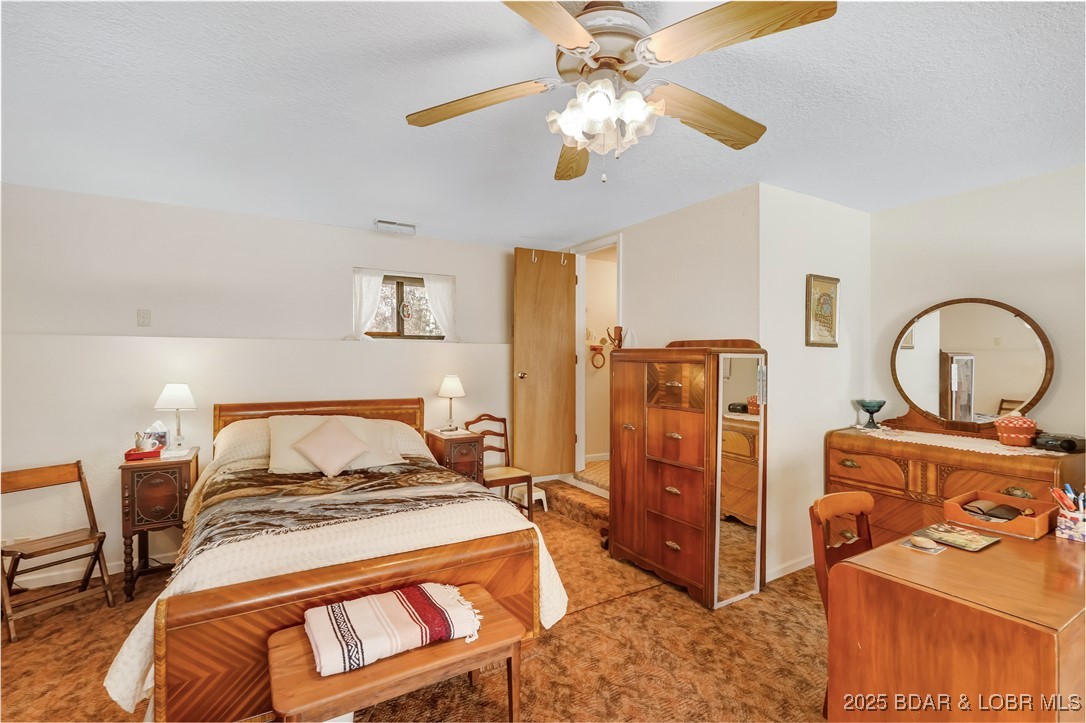 16376 Twisted Tree Road Barnett, MO 65011 - Photo 16 of 48 Large bedroom with room for desk & multiple dresse
