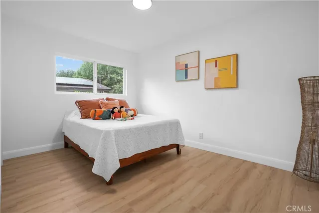 a room with a bed and a window