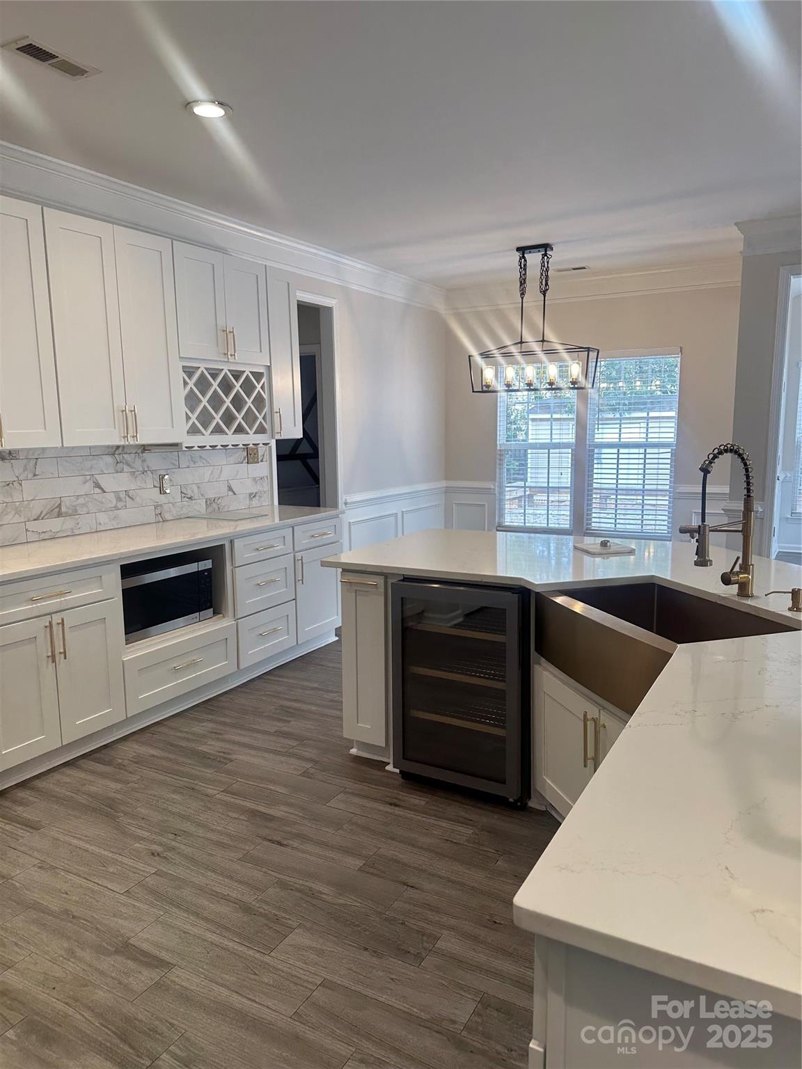 618 Circle Trace Road Monroe, NC 28110 - Photo 6 of 21 a kitchen with stainless steel appliances granite countertop a sink and dishwasher a stove with wooden floors