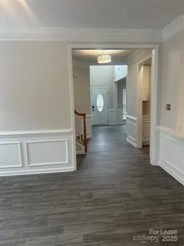 wooden floor in a hall with an entryway