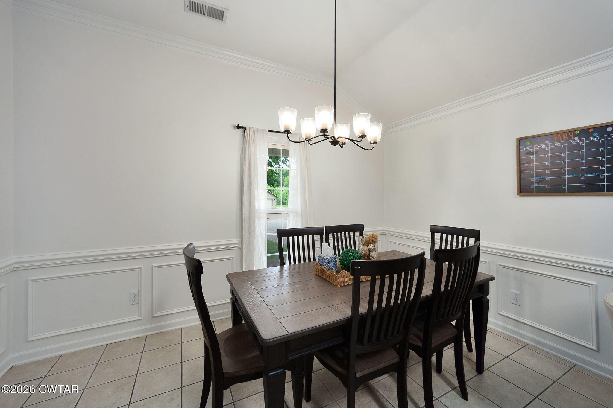 80 Rooker Drive Jackson, TN 38305 - Photo 9 of 30 a view of a dining room with furniture and chandelier