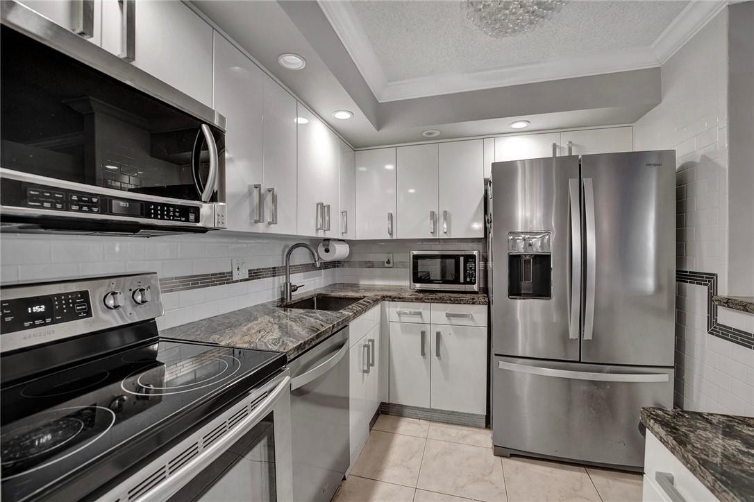 9620 West McNab Road, Unit 105 Tamarac, FL 33321 - Photo 9 of 34 Photo 9