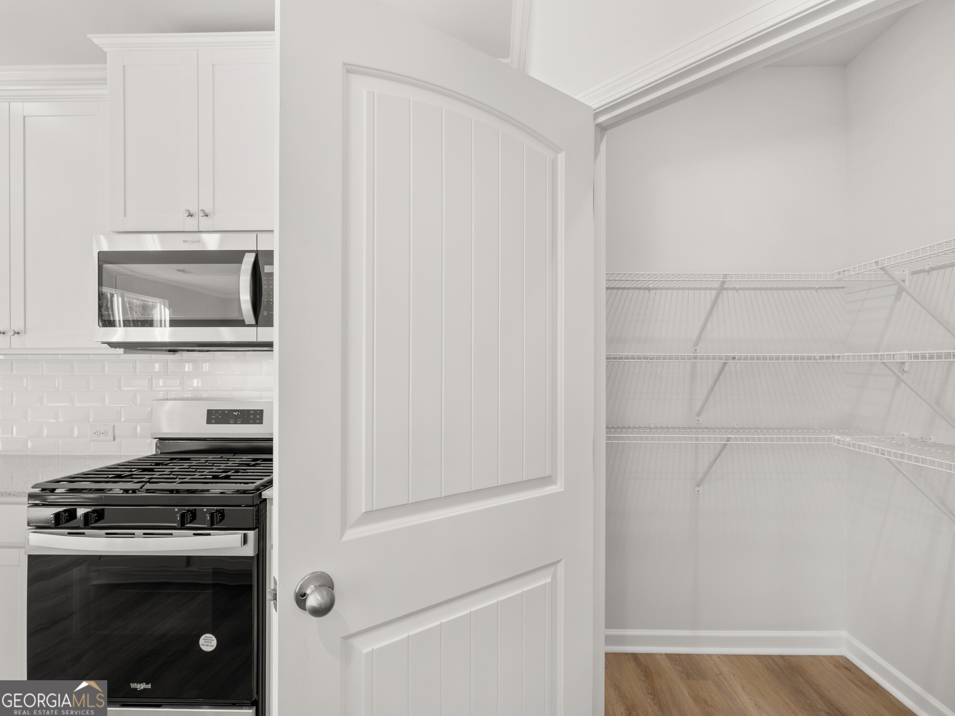 156 Hampton Drive Dallas, GA 30132 - Photo 11 of 81 a kitchen with appliances and cabinets